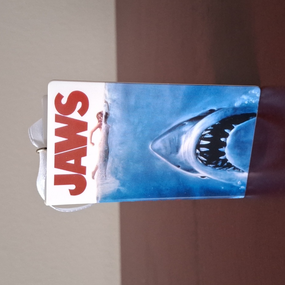 JAWS Movie Hallmark Christmas Ornament - shape of a VHS Tape in Clamshell NIB